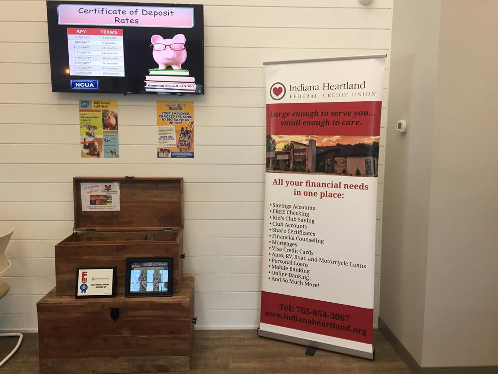 Customer photo from MARY of our Ideal Retractable Banner Display - 33-1/2", a display of a credit union