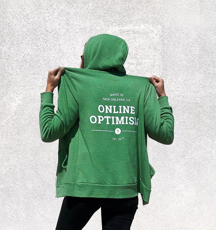 a person in a green hoodie