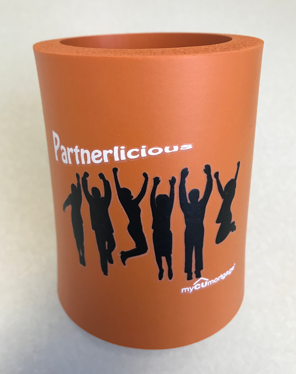 Customer photo from Robert of our KOOZIE® Holder with Transfer Imprint, a brown cup with black silhouettes on it