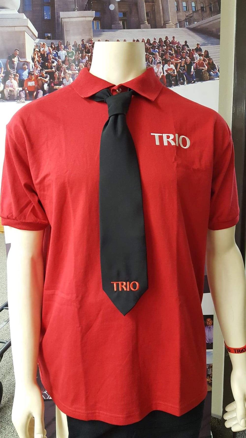 Customer photo from Maurice of our Hanes ComfortBlend 50/50 Jersey Sport Shirt - Men's - Embroidered, a red shirt with a black tie
