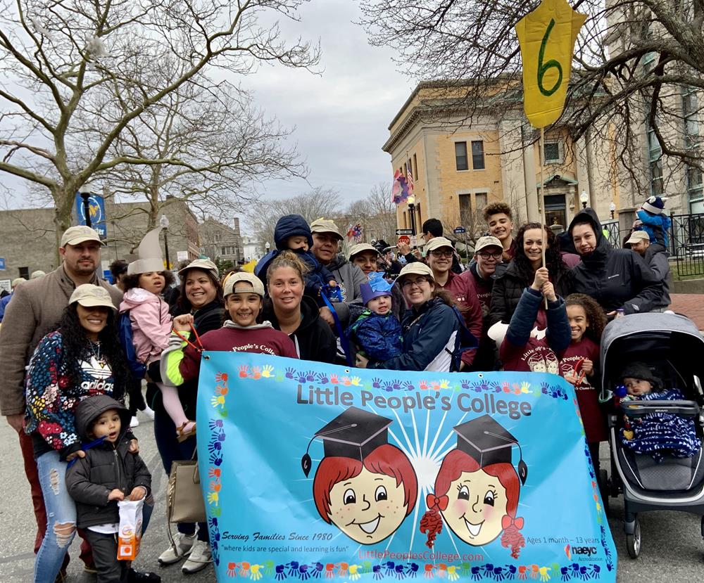 Customer photo from Kathleen of our Value Outdoor Banner - 3' x 6' - 24 hr, a group of people posing for a photo