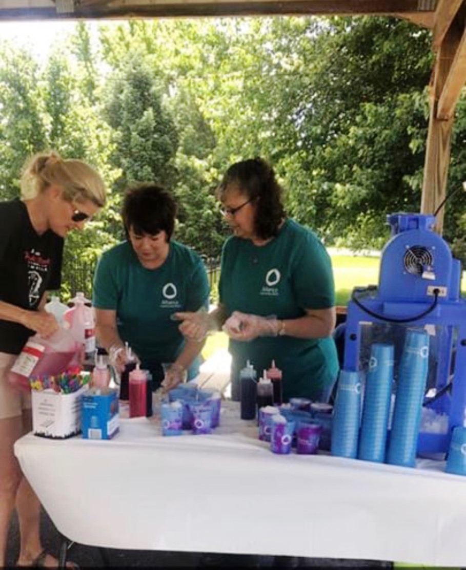 Customer photo from Lindsy of our Mood Stadium Cup - 12 oz, a group of women standing at a table