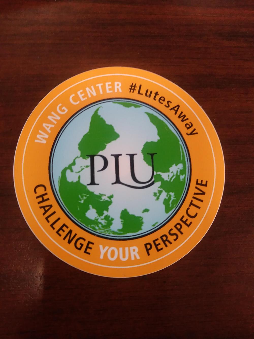 Customer photo from Rosemary of our Full Color Sticker - Circle - 3", a sticker on a table