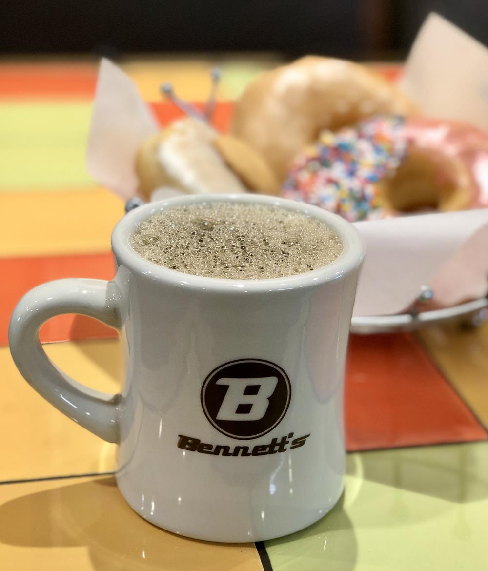 a coffee mug with foam in it