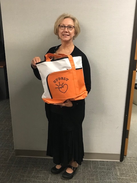 Customer photo from Teresa of our Color Bright Tote, a woman holding a bag