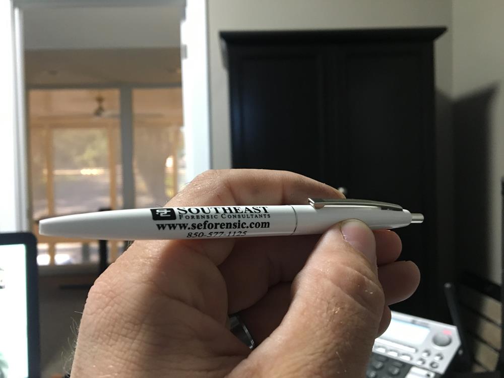Customer photo from David of our Clic Pen, a hand holding a pen