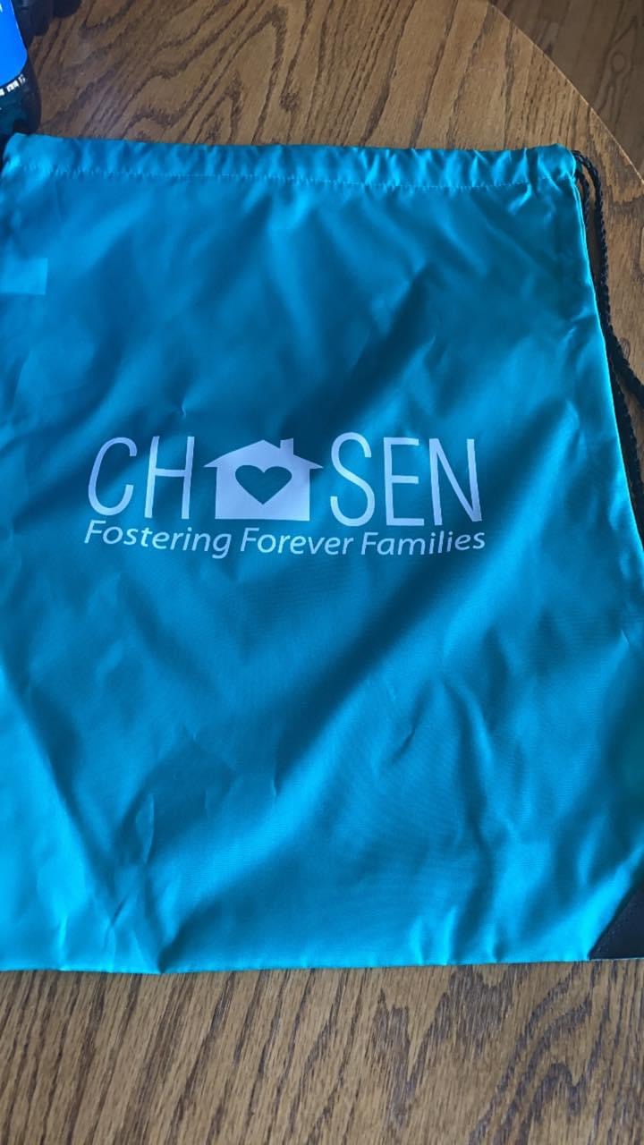Customer photo from Karen of our Drawstring Sportpack - 18" x 14", a blue bag with white text on it