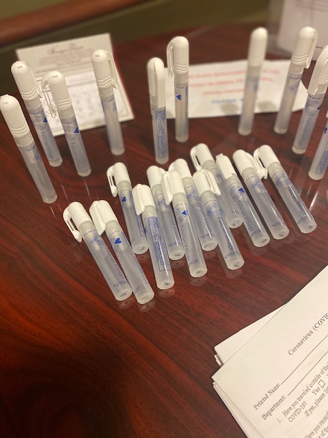 Customer photo from Michael of our Pocket Spray Sanitizer, a group of pens on a table