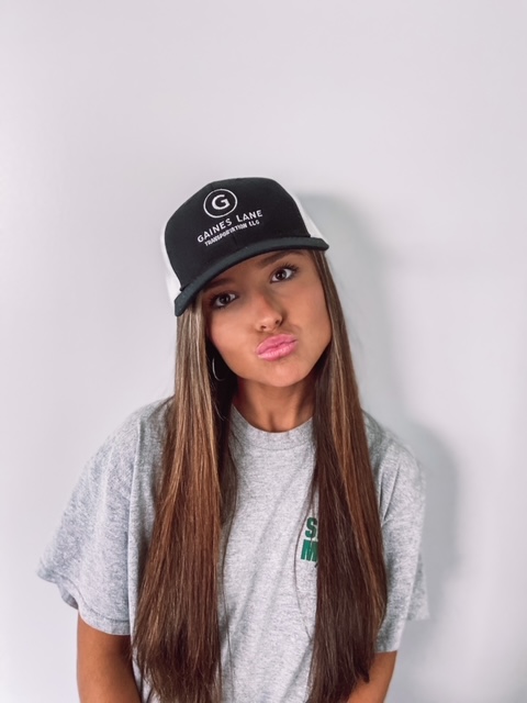 Customer photo from Samantha of our Structured Cotton Twill Trucker Cap, a woman wearing a hat