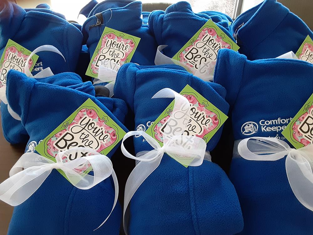Customer photo from Edna of our Crossland Fleece Jacket - Men's, a group of blue blankets with white bows