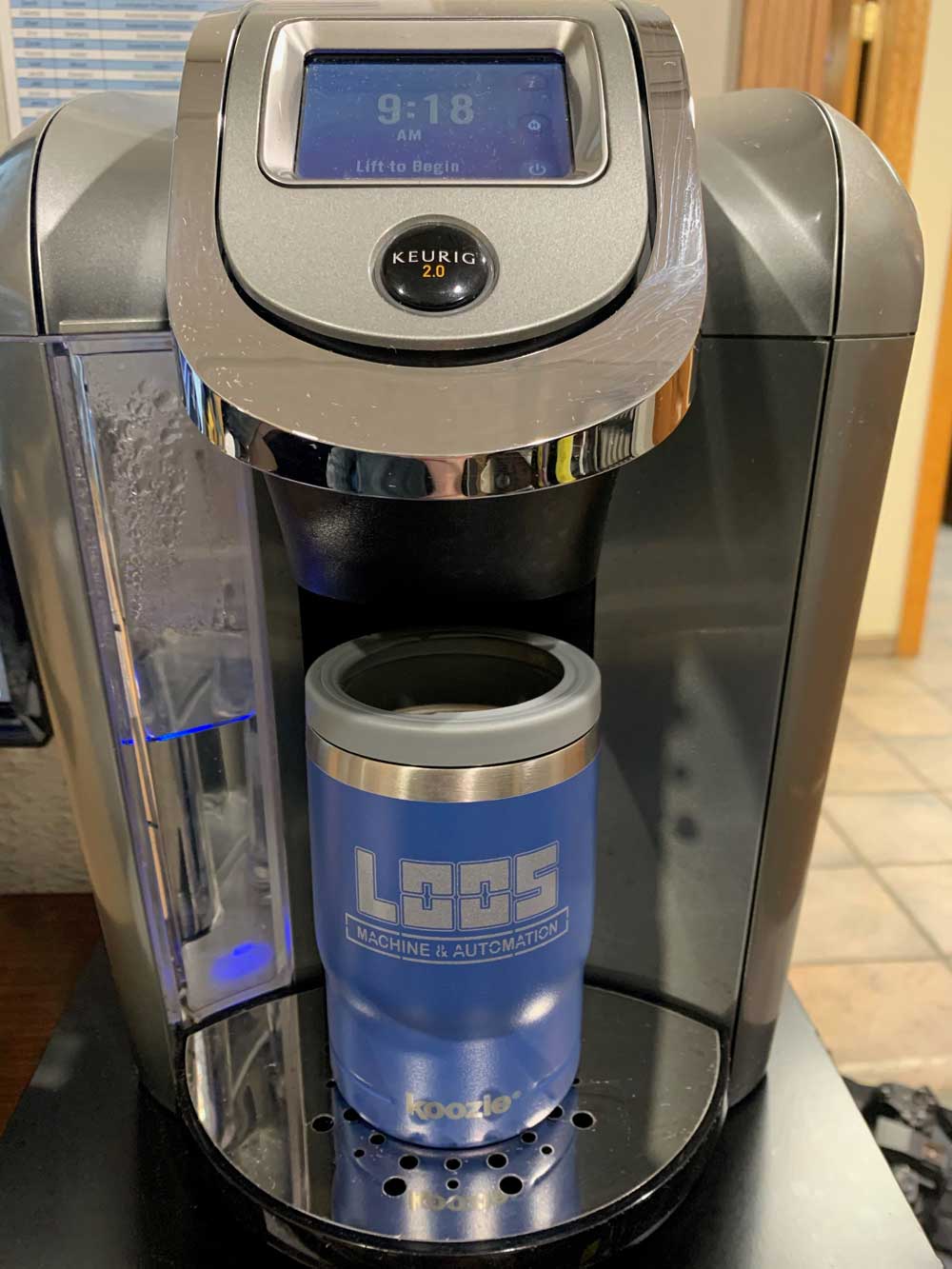 Customer photo from Stacy of our Koozie® Vacuum Insulator Tumbler - 11 oz. - 24 hr, a coffee machine with a blue can