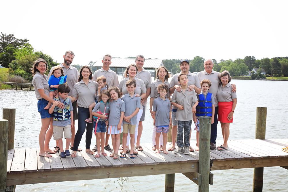 Customer photo from Phyllis of our Superblend Pique Polo - Men's, a group of people standing on a dock