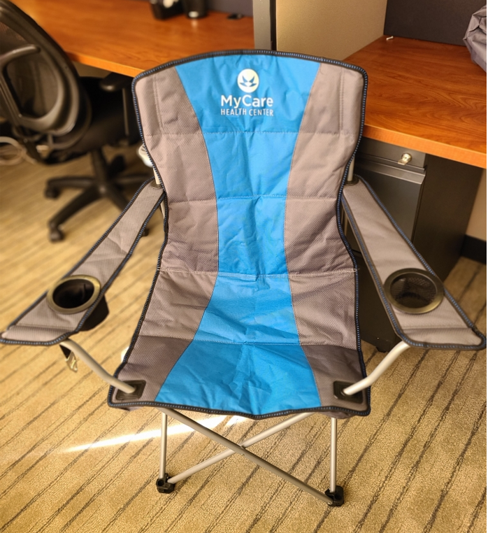 Customer photo from Charlene of our Premium Stripe Chair, a blue and grey folding chair