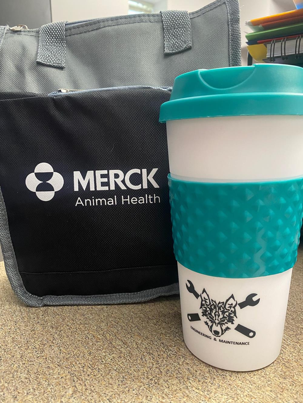 Customer photo from Kimberly of our Color Banded Classic Coffee Cup - 16 oz. - 24 hr, a coffee cup next to a bag