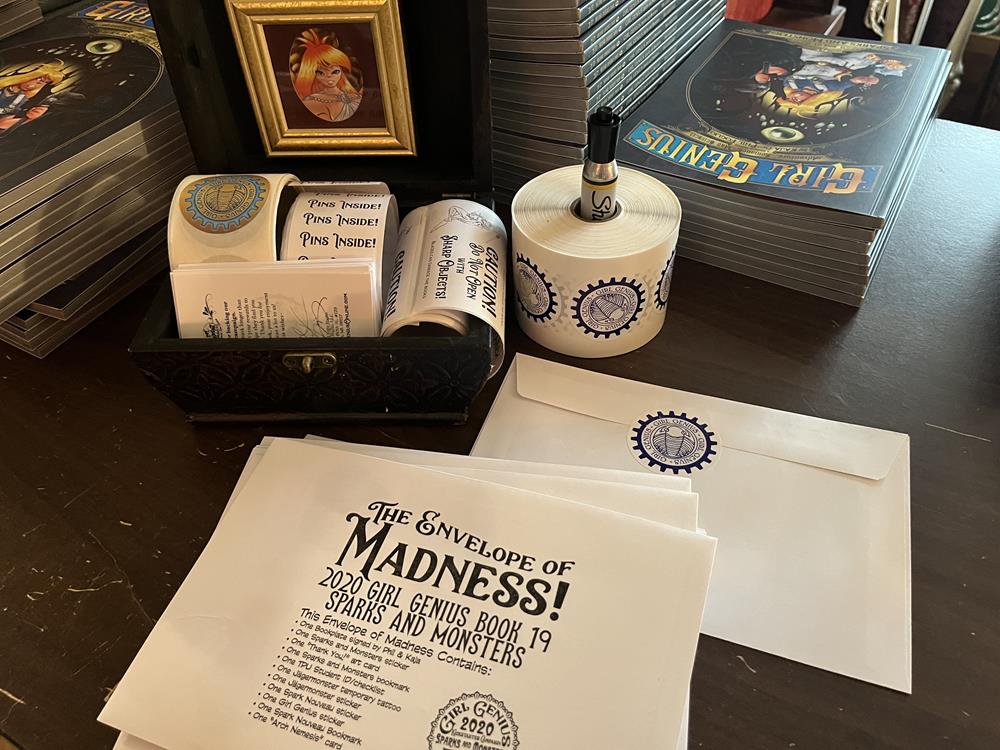 Customer photo from Kaja of our Value Sticker by the Roll - Circle - 2", a stack of books and papers on a table