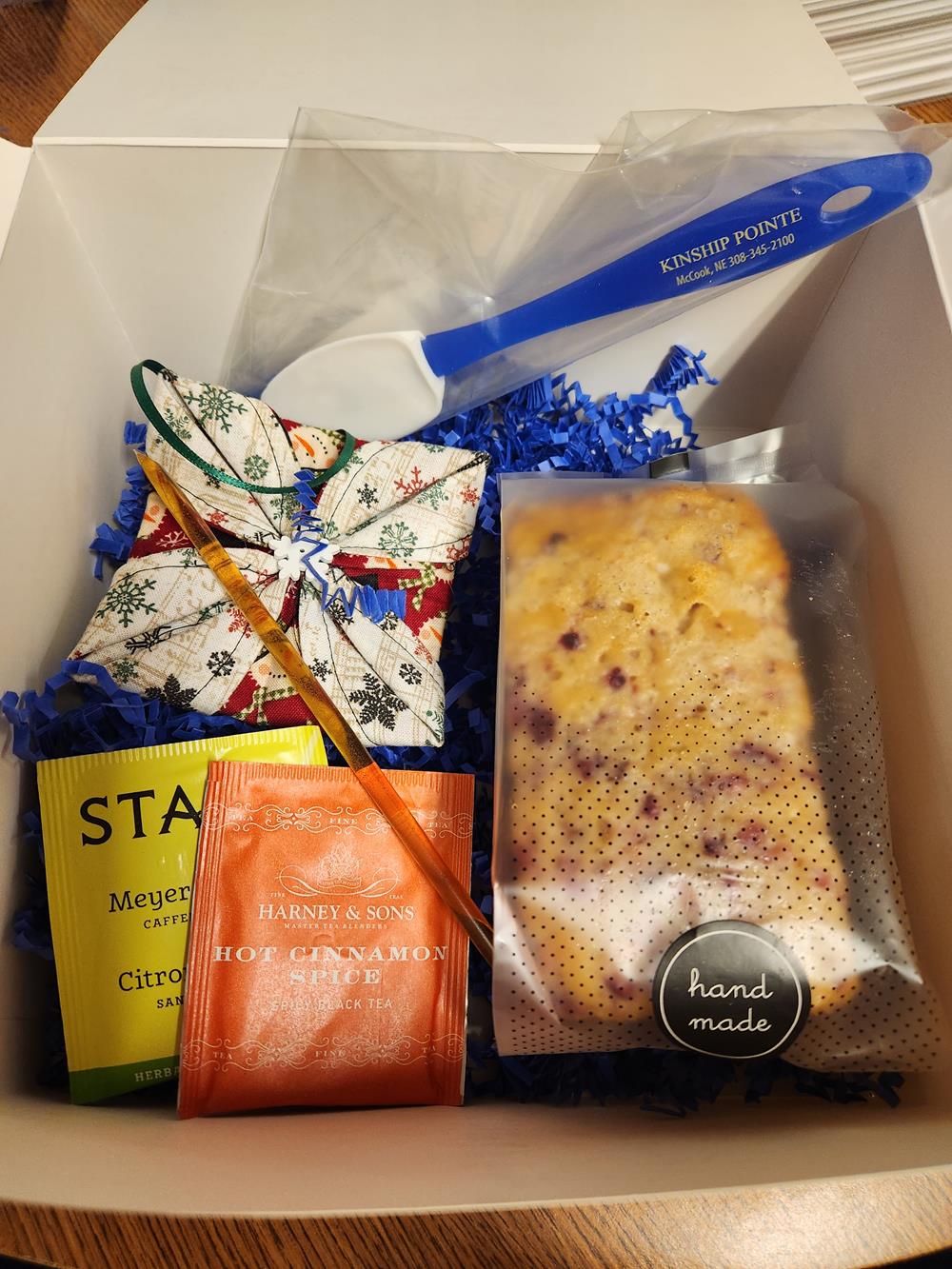 Customer photo from Judy of our Mini Silicone Spatula - Translucent, a box with food and a spoon