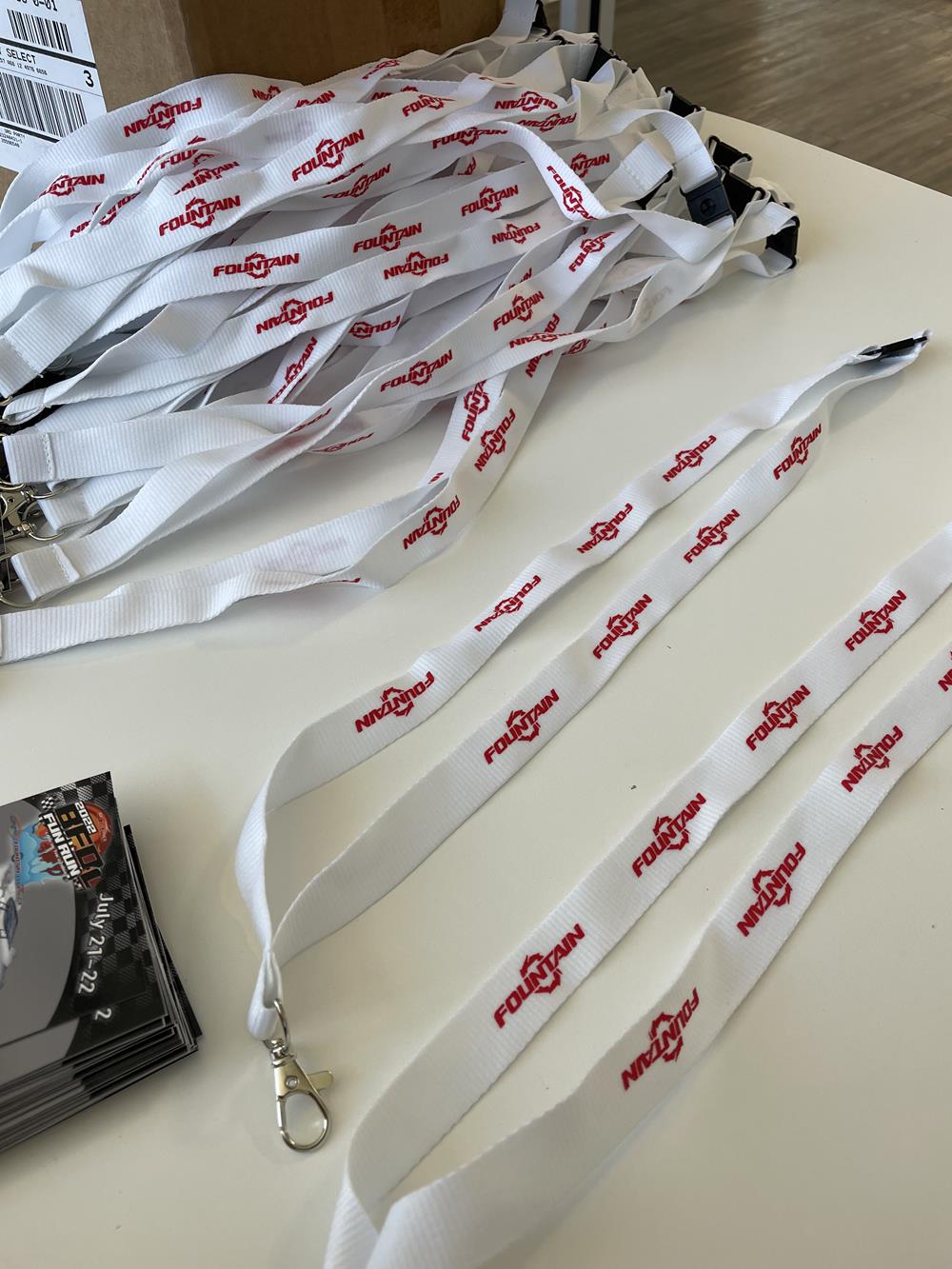 a group of lanyards on a table