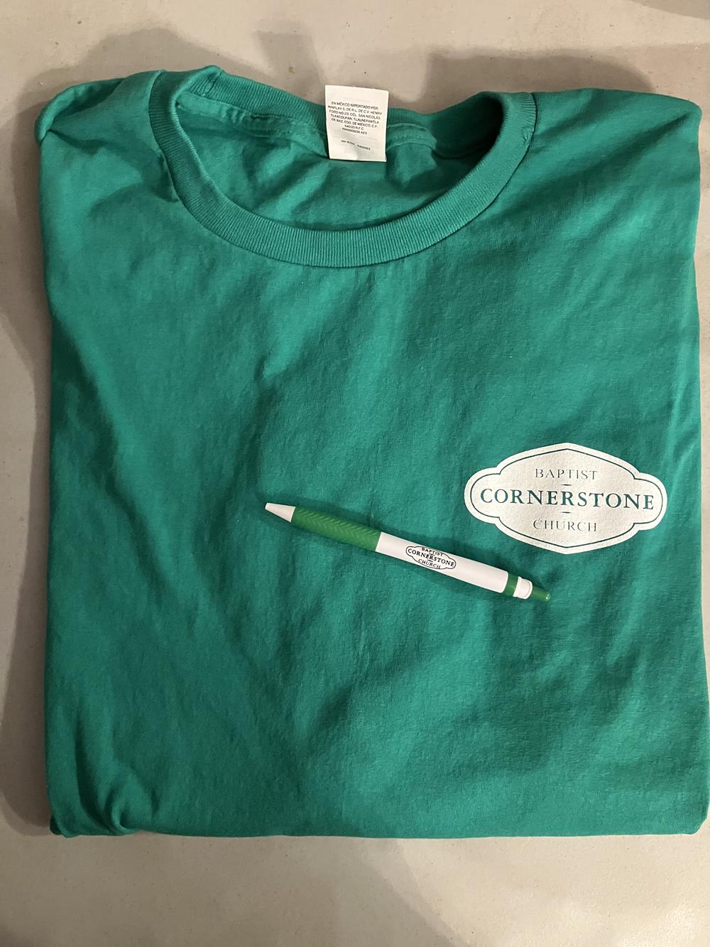 Customer photo from Brian of our Hanes 50/50 ComfortBlend T-Shirt - Screen - Colors, a green shirt with a pen on it