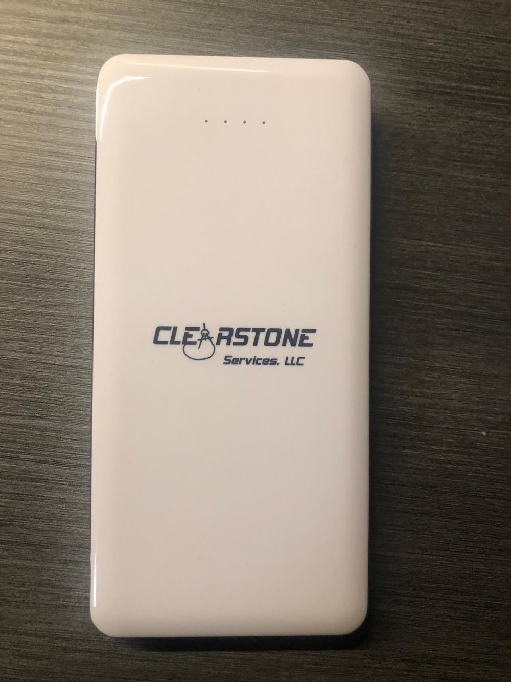 a white rectangular device with a logo on it