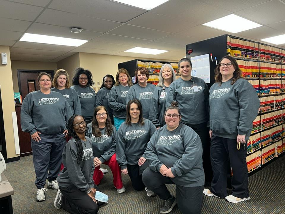 Customer photo from Robyn of our Gildan Softstyle Fleece Crew Sweatshirt - Screen, a group of women posing for a photo