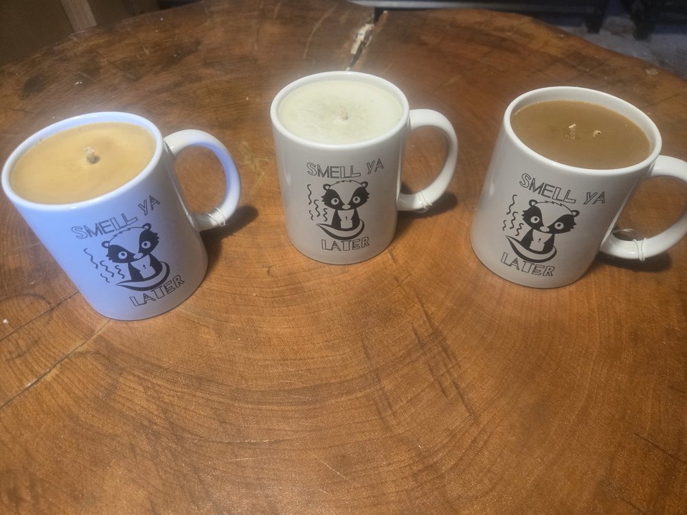 Customer photo from Jeremy of our Value White Coffee Mug - 11 oz, a group of coffee mugs with candles on a table