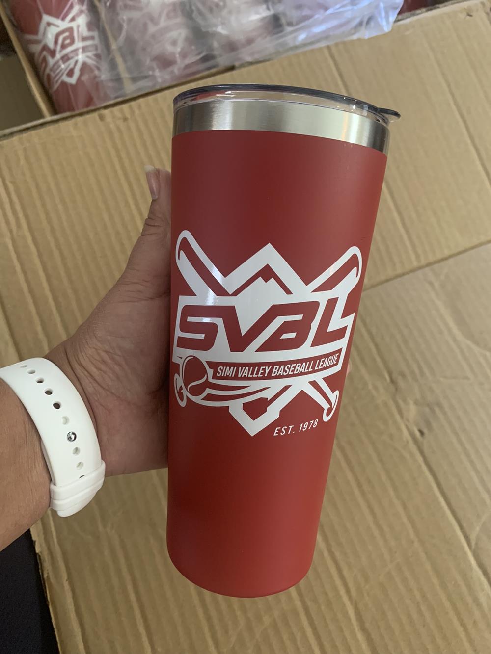 Customer photo from Karen of our Colma Vacuum Tumbler with Straw - 22 oz. - Colors, a person holding a red and silver tumbler