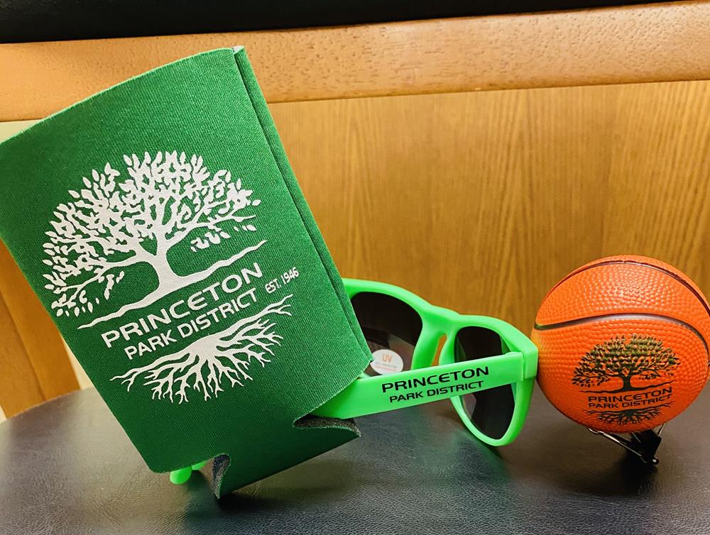 a green sunglasses and a small ball
