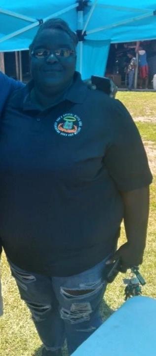 Customer photo from Tamieka of our Dry-Mesh Hi-Performance Polo - Men's - Embroidered, a man in a blue shirt