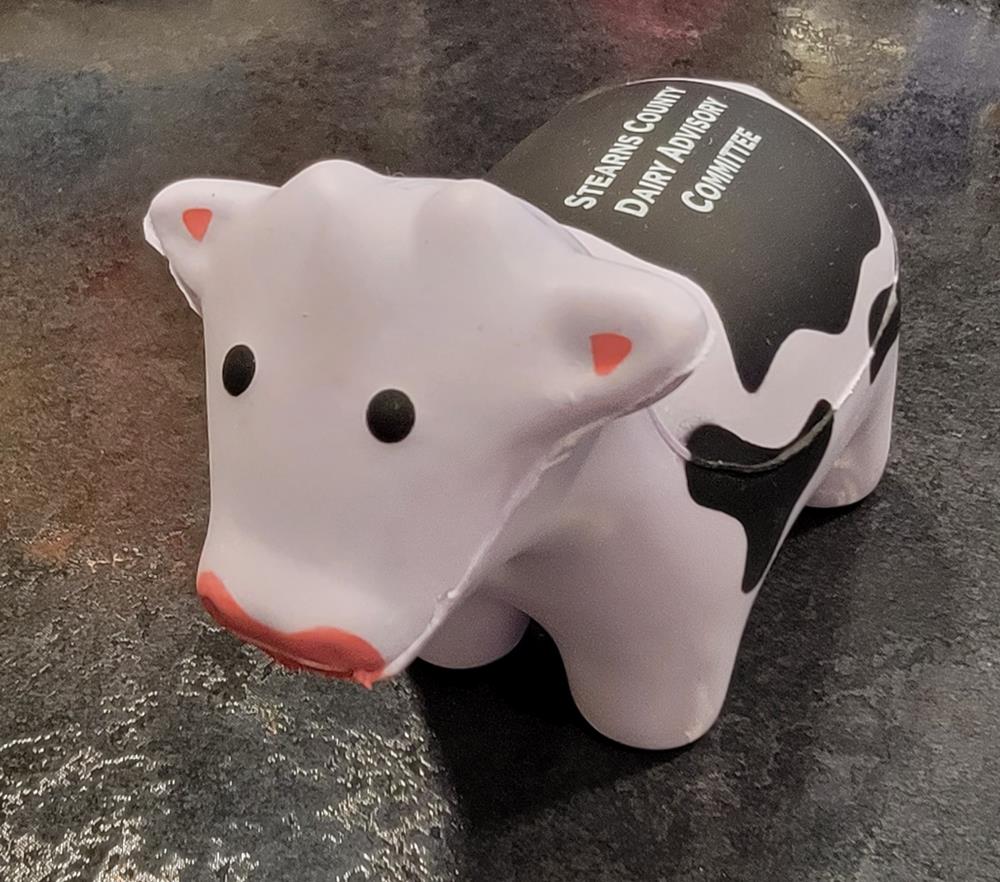 Customer photo from Sandi of our Stress Reliever - Cow - 24 hr, a cow shaped toy on a counter