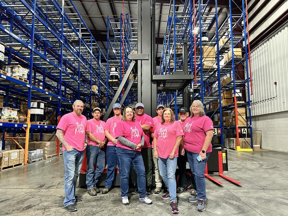 Customer photo from Teri of our Port Classic 5.4-oz T-Shirt - Men's - Screen, a group of people in a warehouse