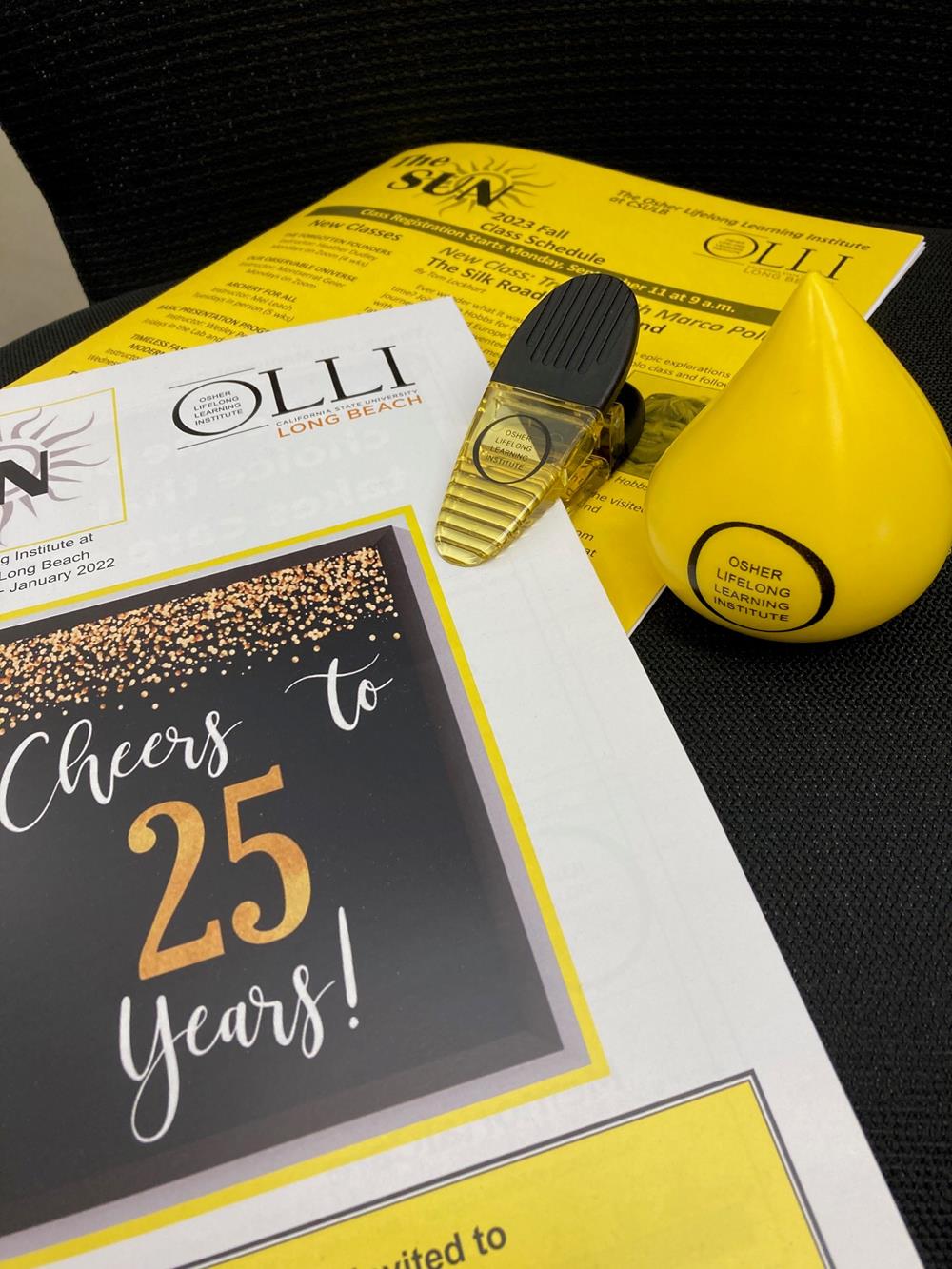 Customer photo from Rebecca of our Power Clip - Translucent, a yellow and black paper with a yellow object on it