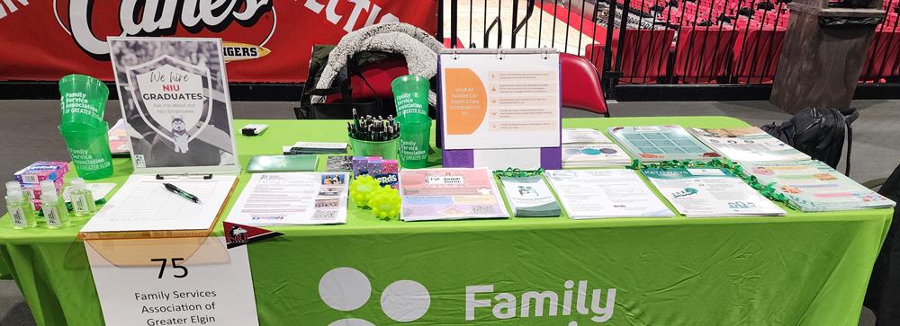 Customer photo from Allison of our Translucent Stadium Cup - 16 oz., a table with a green tablecloth and a sign