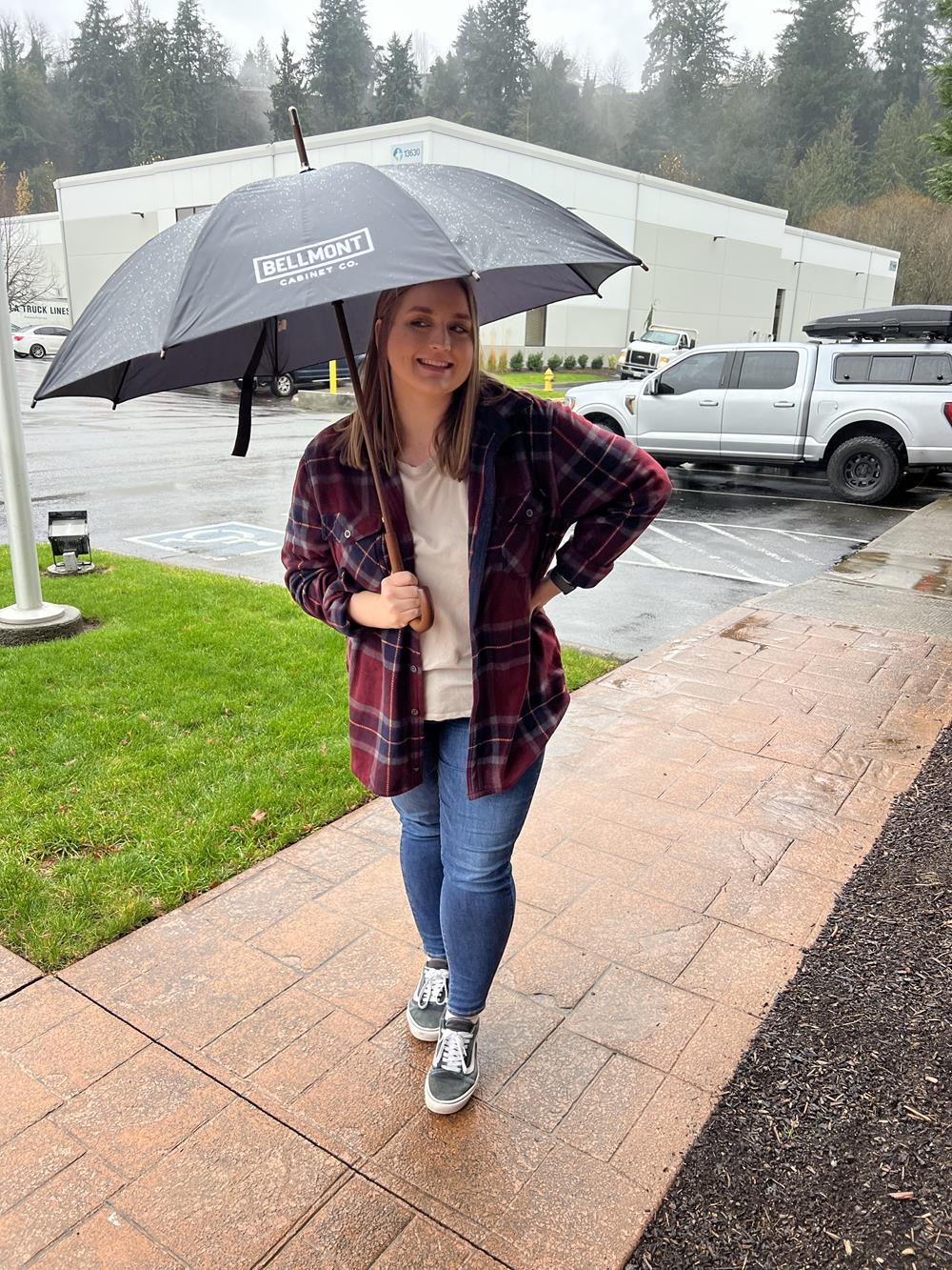 Customer photo from Shelby of our The Hotel Umbrella - 48" Arc, a woman holding an umbrella