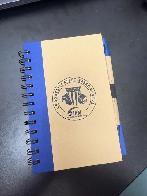 a notebook with a blue cover