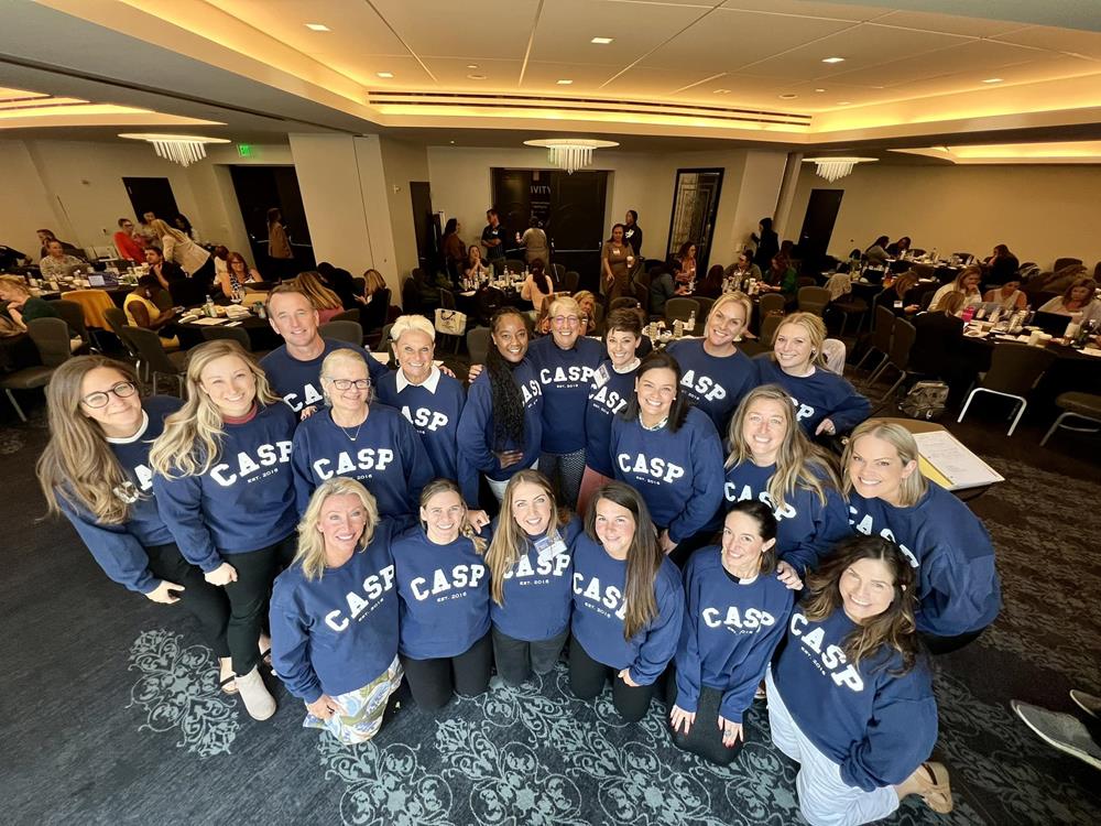 Customer photo from CAS of our Comfort Colors Garment-Dyed Crew Sweatshirt - Screen, a group of people posing for a photo