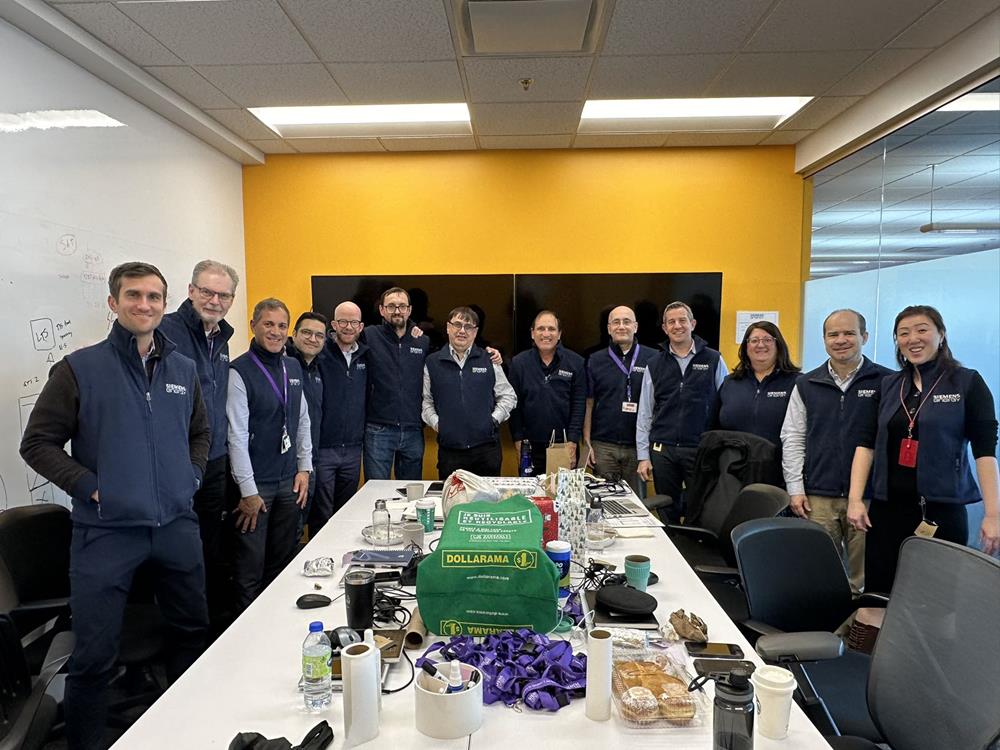 Customer photo from Anthony of our Crossland Fleece Vest - Men's, a group of people standing around a table