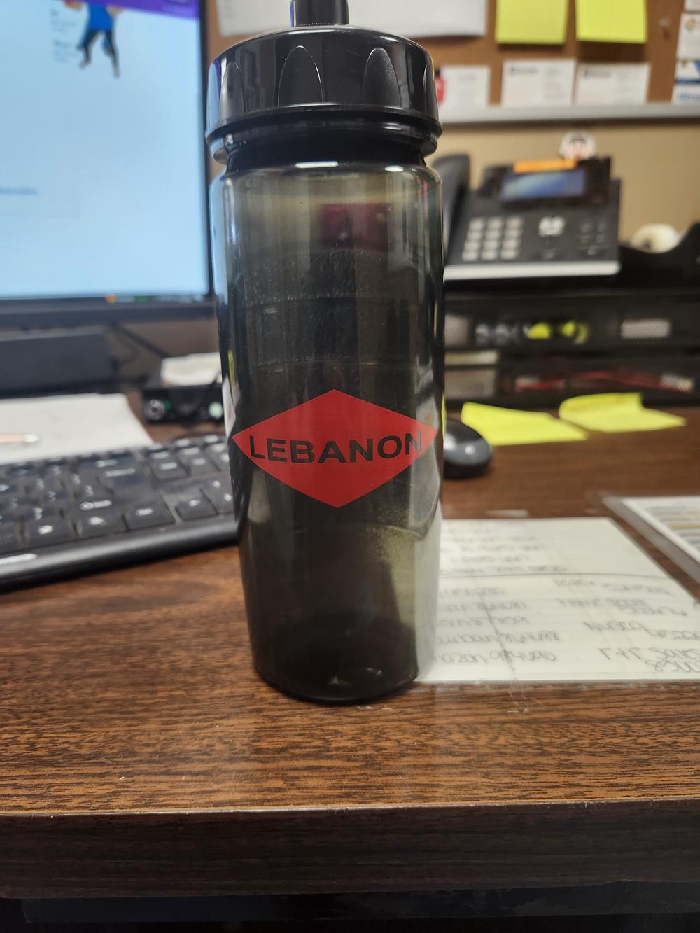 a bottle on a desk