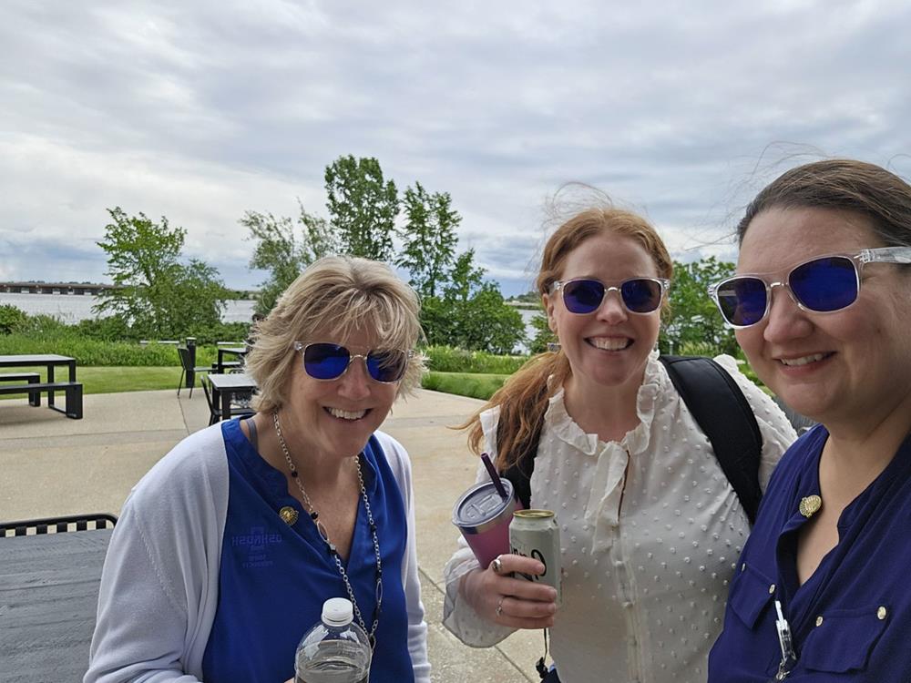 Customer photo from Brittney of our Risky Business Sunglasses - Clear, a group of women wearing sunglasses and smiling