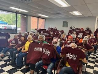 Customer photo from Esmeralda of our Hanes Authentic T-Shirt - Screen - Colors, a group of people sitting in chairs