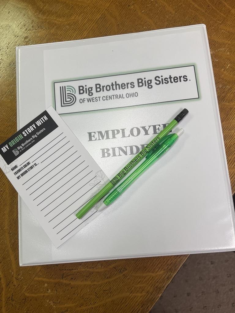 Customer photo from Portia of our Mood Pencil - Black Eraser, a pen and a notepad on a binder