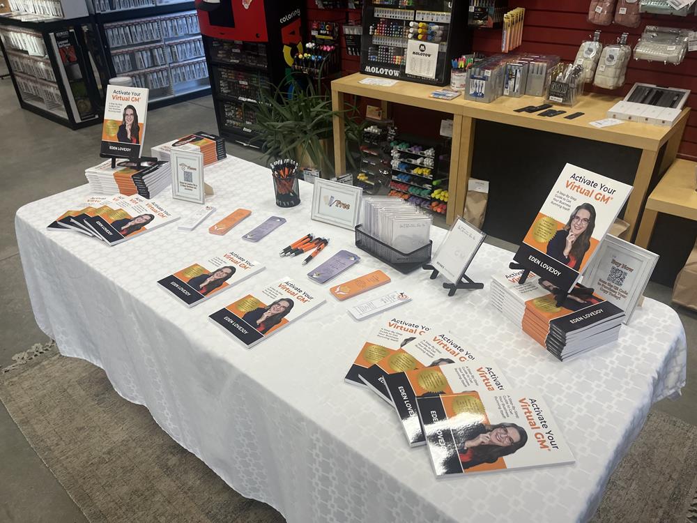 Customer photo from Eden of our Bennington Pen, a table with books and stationery on it