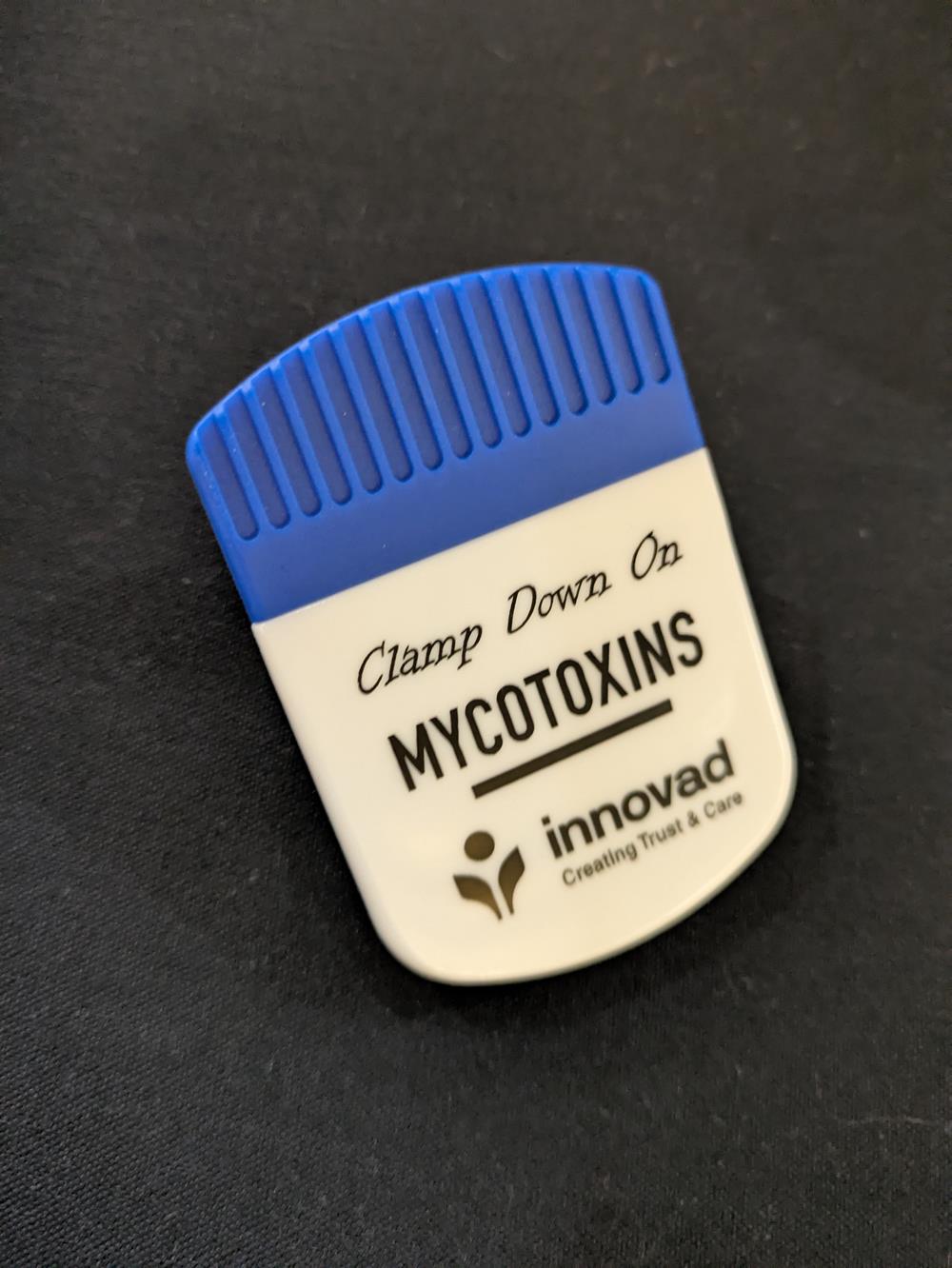 Customer photo from Cathy of our Magnet Clip - Jumbo - Opaque, a blue and white object with black text
