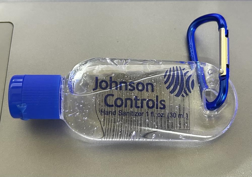 Customer photo from John of our Clip N Go Hand Sanitizer - 1 oz., a hand sanitizer bottle with a blue handle