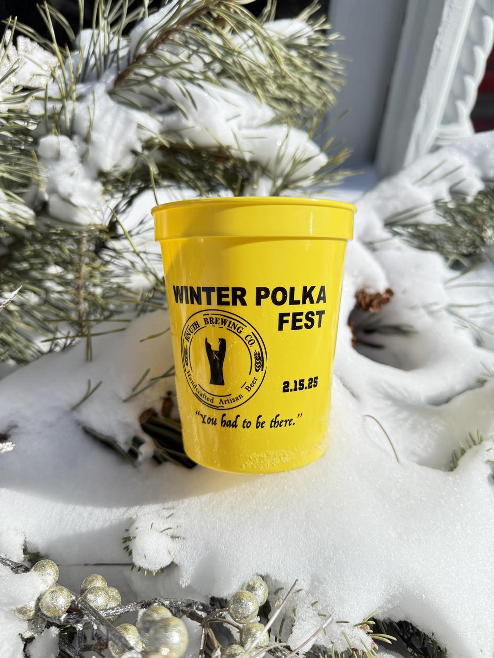 Customer photo from Brad of our Event Stadium Cup - 16 oz., a yellow cup in snow