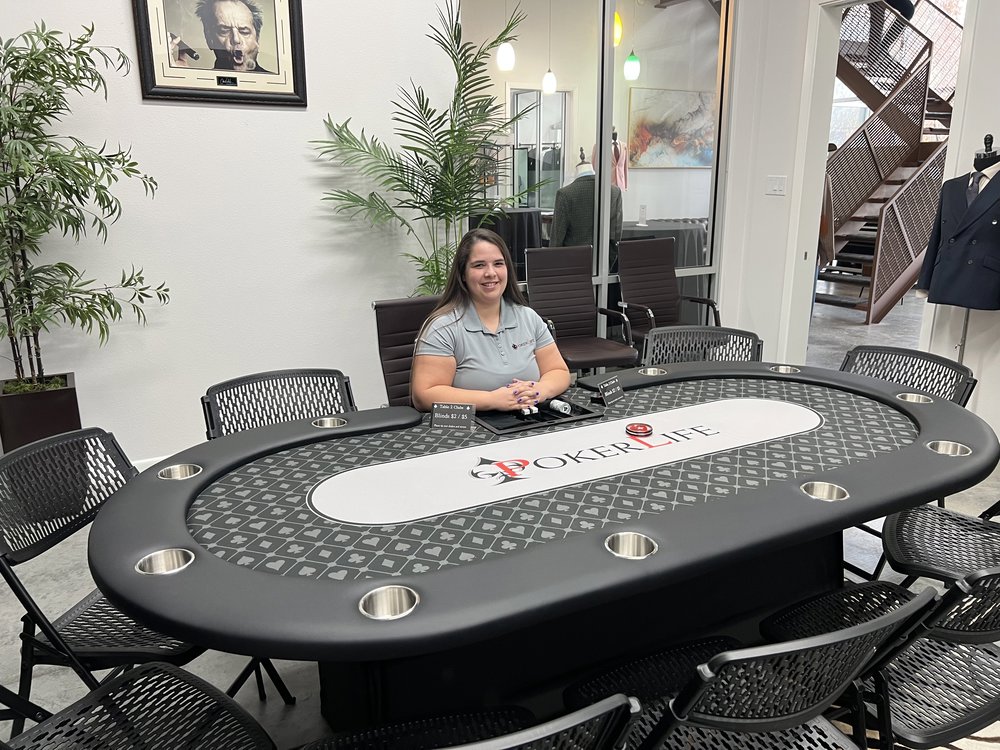 Customer photo from Scott of our Micro Mesh UV Performance Polo - Men's - Embroidered, a woman sitting at a poker table