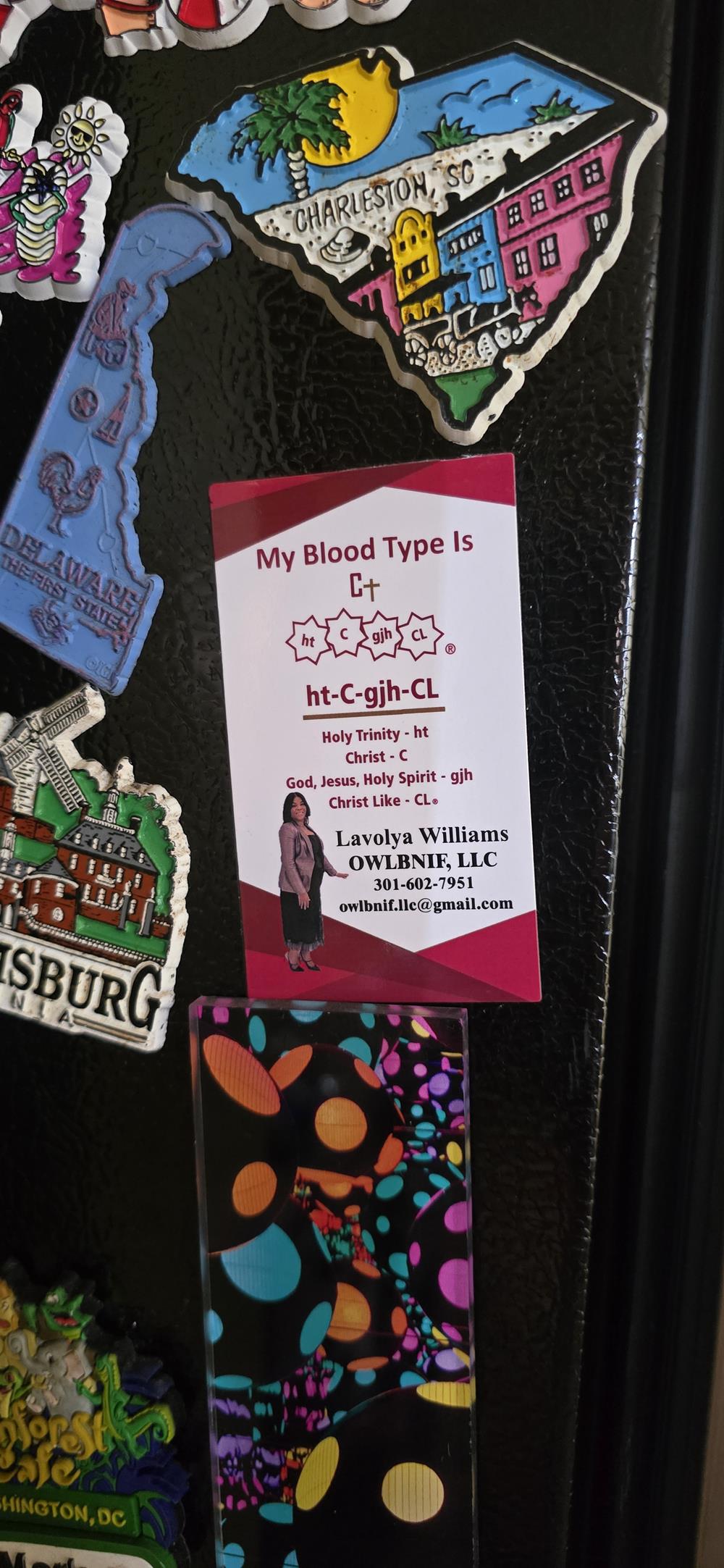 Customer photo from Lavolya of our Business Card Magnet - 20 mil - 24 hr, a magnets on a black surface