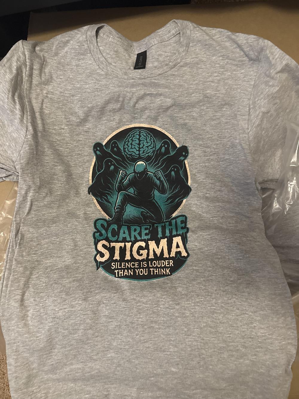 Customer photo from Josph of our Gildan Softstyle T-Shirt - Men's - Full Color, a grey shirt with a picture of a person on it