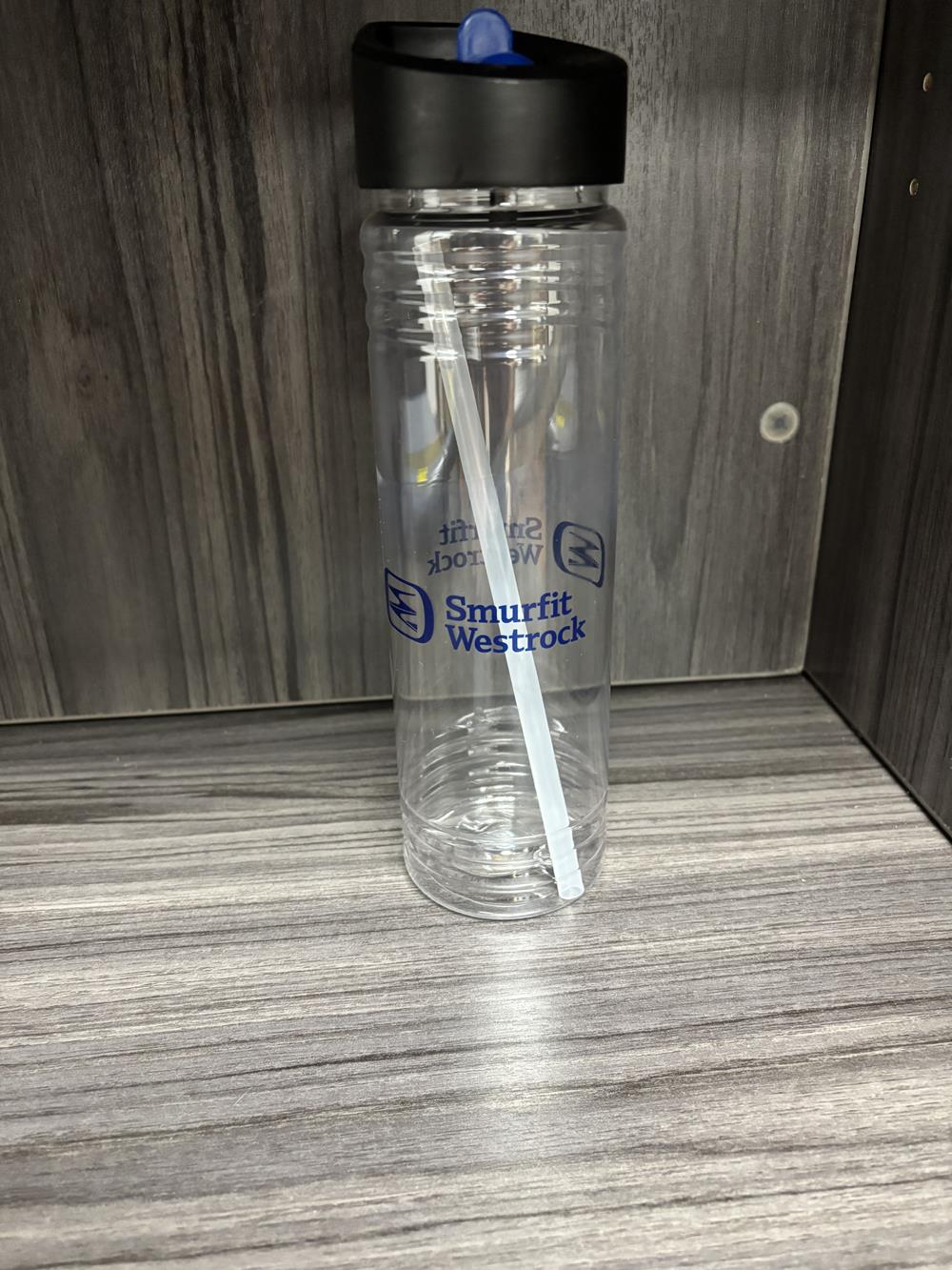 Customer photo from Michael of our Clear Impact Halcyon Water Bottle with Two-Tone Flip Straw Lid - 24 oz, a plastic water bottle with a straw