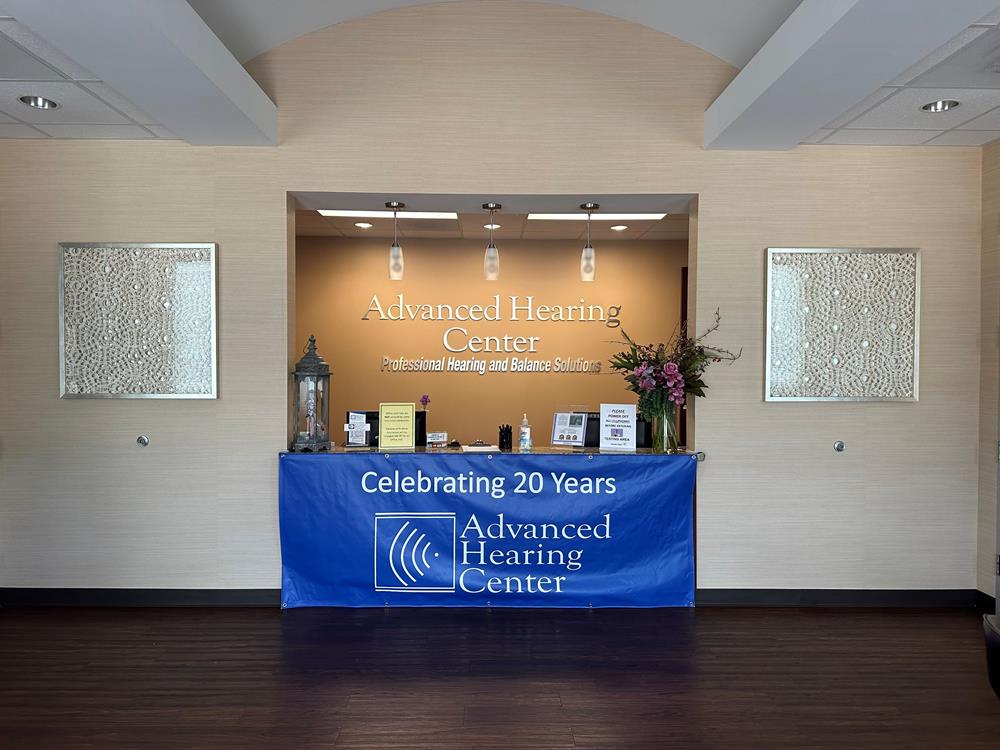Customer photo from Terry of our Vinyl Banner with Rope on Corners - 3' x 8', a sign on a wall