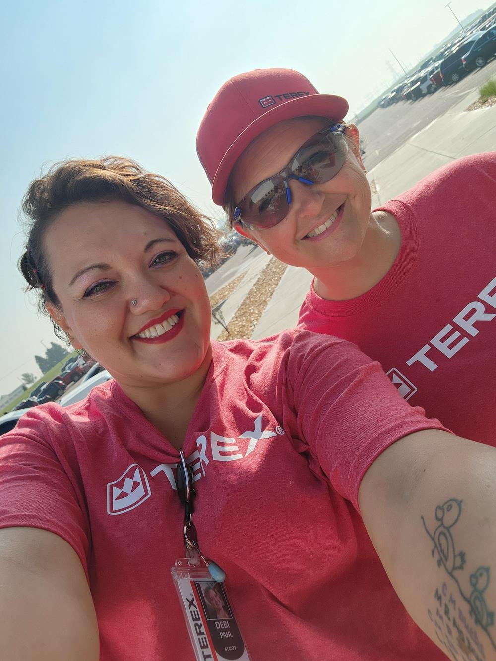 Customer photo from Debi of our Port 50/50 Blend T-Shirt - Men's - Screen, a selfie of a couple of people